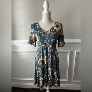 Teal, tan, cream and black dress. Has an attached slip.